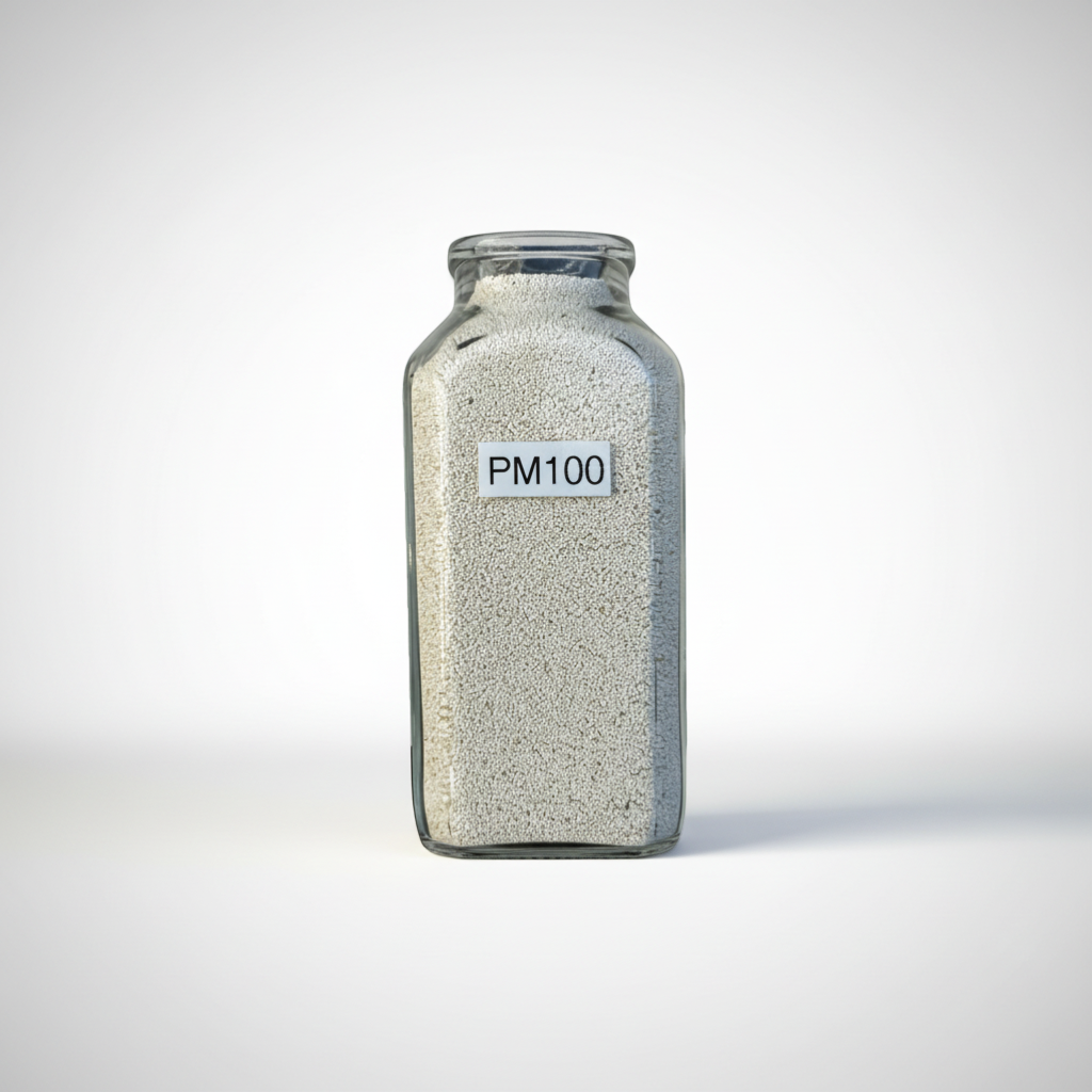 Pureflow Off-the-Shelf Catalog PM-100 filter media in a glass jar, a granular catalytic-adsorptive media for heavy metal removal.